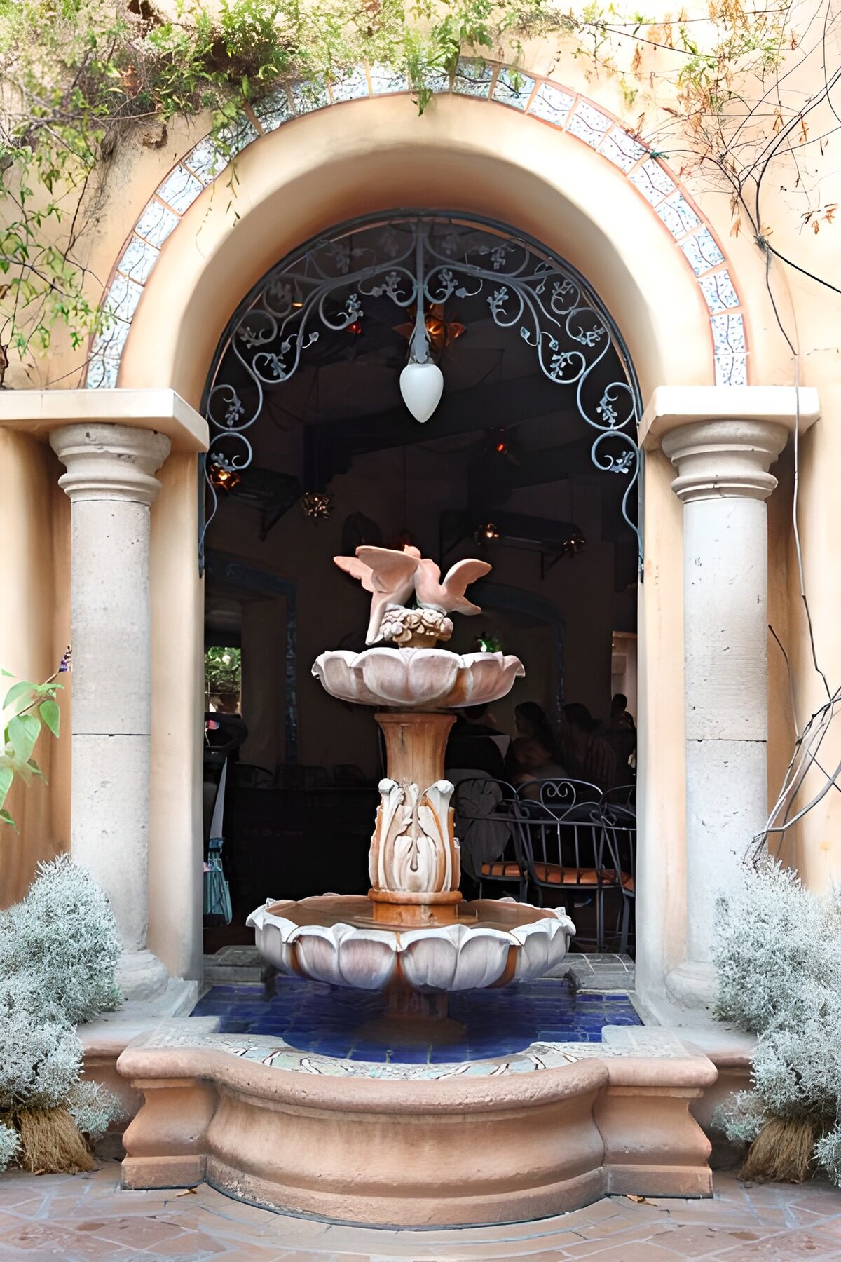 WCUK46177: Round arch with fountain and inside  view