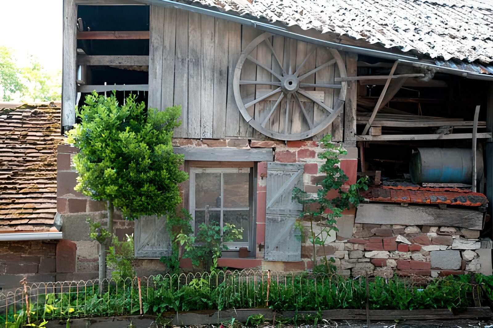 WCUK80063: Old French farm with old wheel and shutters etc version 2