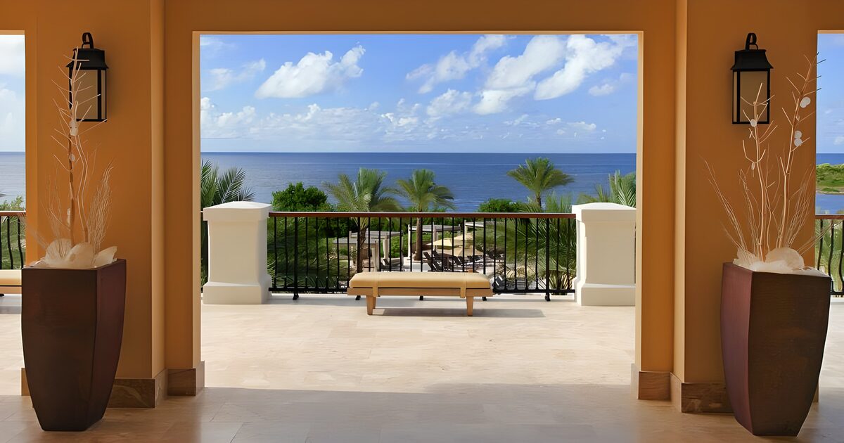 WCUK26896: View from the resort towards the palm trees  and over the Caribbean