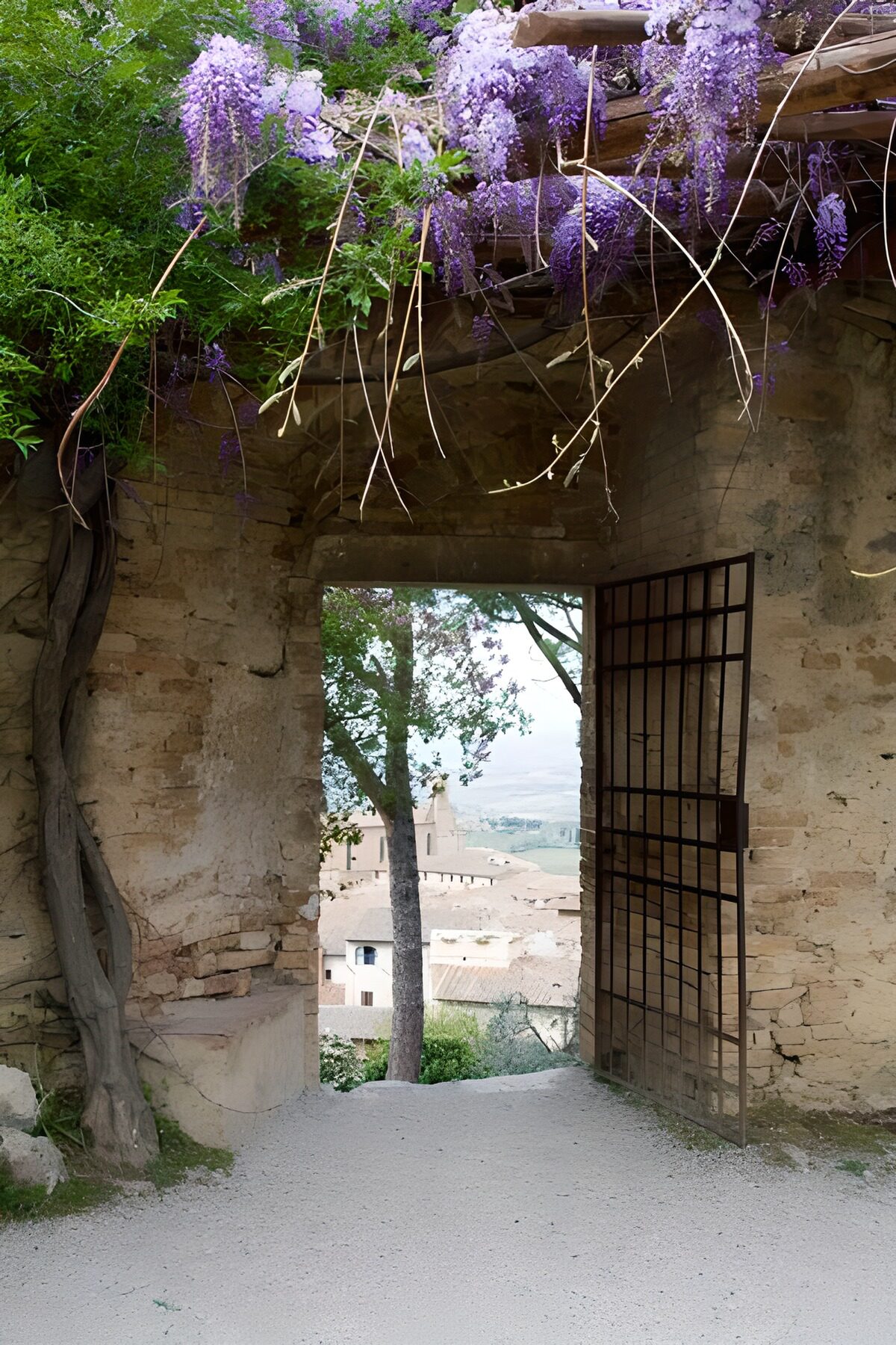 Old metal gate with view to the village