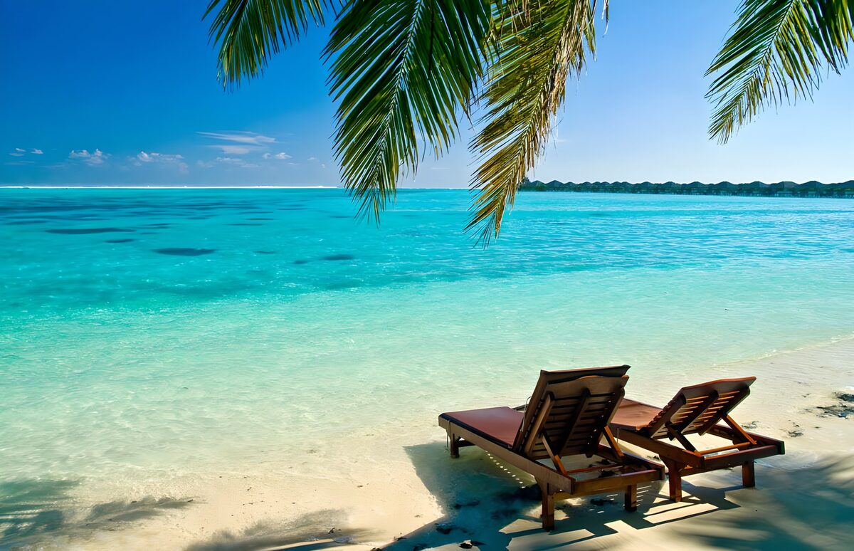 WCUK48057: Wooden deckchairs at the Caribbean
