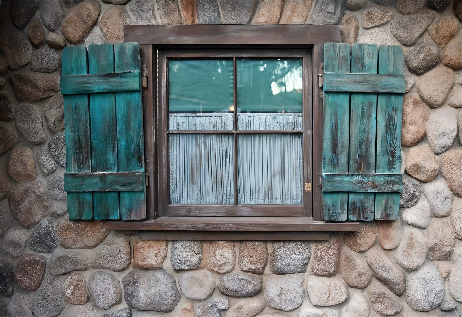 WCUK74153: Cottage with window made of boulders and green shutters