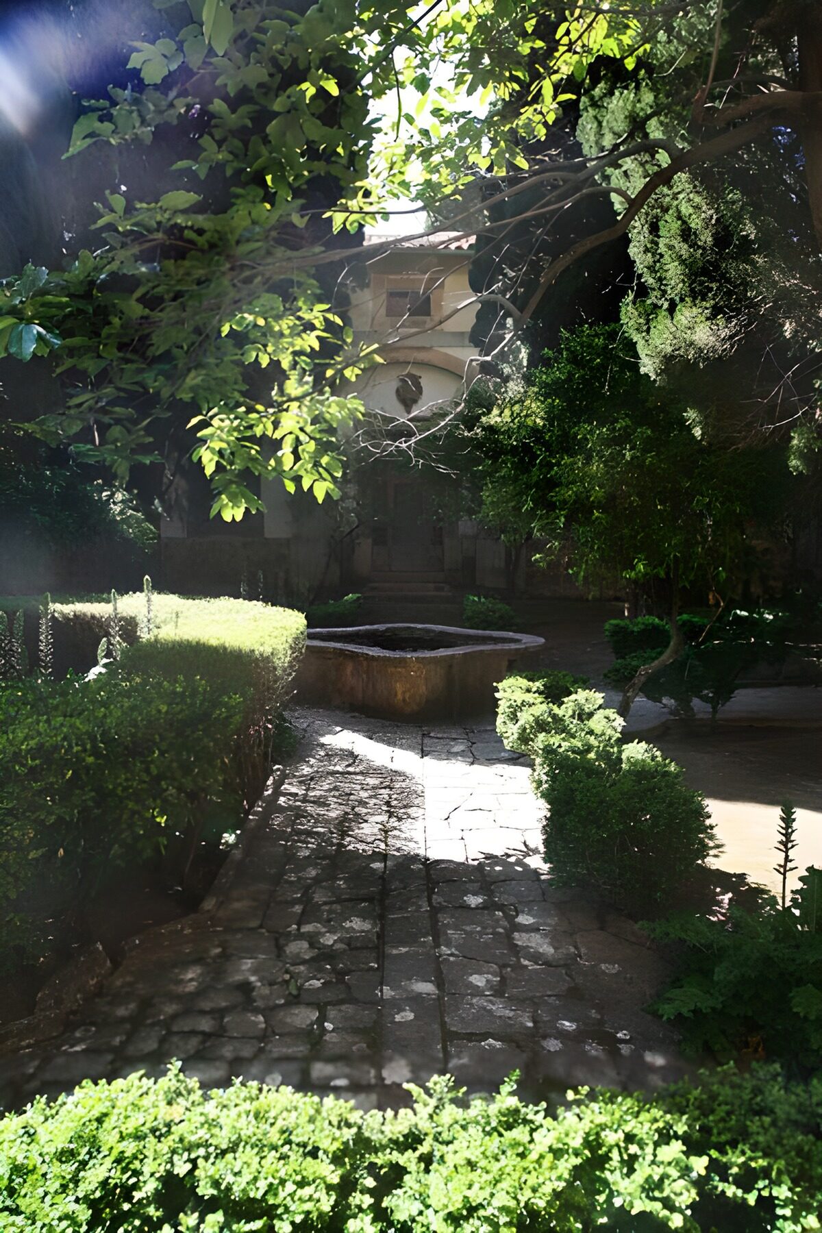 WCUK55691: Fountain with hedge, path and trees